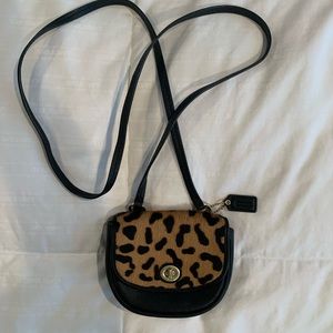 Adorable coach purse with leopard “fur”. Like new condition.